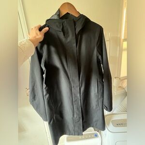 black Uniqlo raincoat